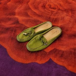 Slide In flat shoe with heel out.